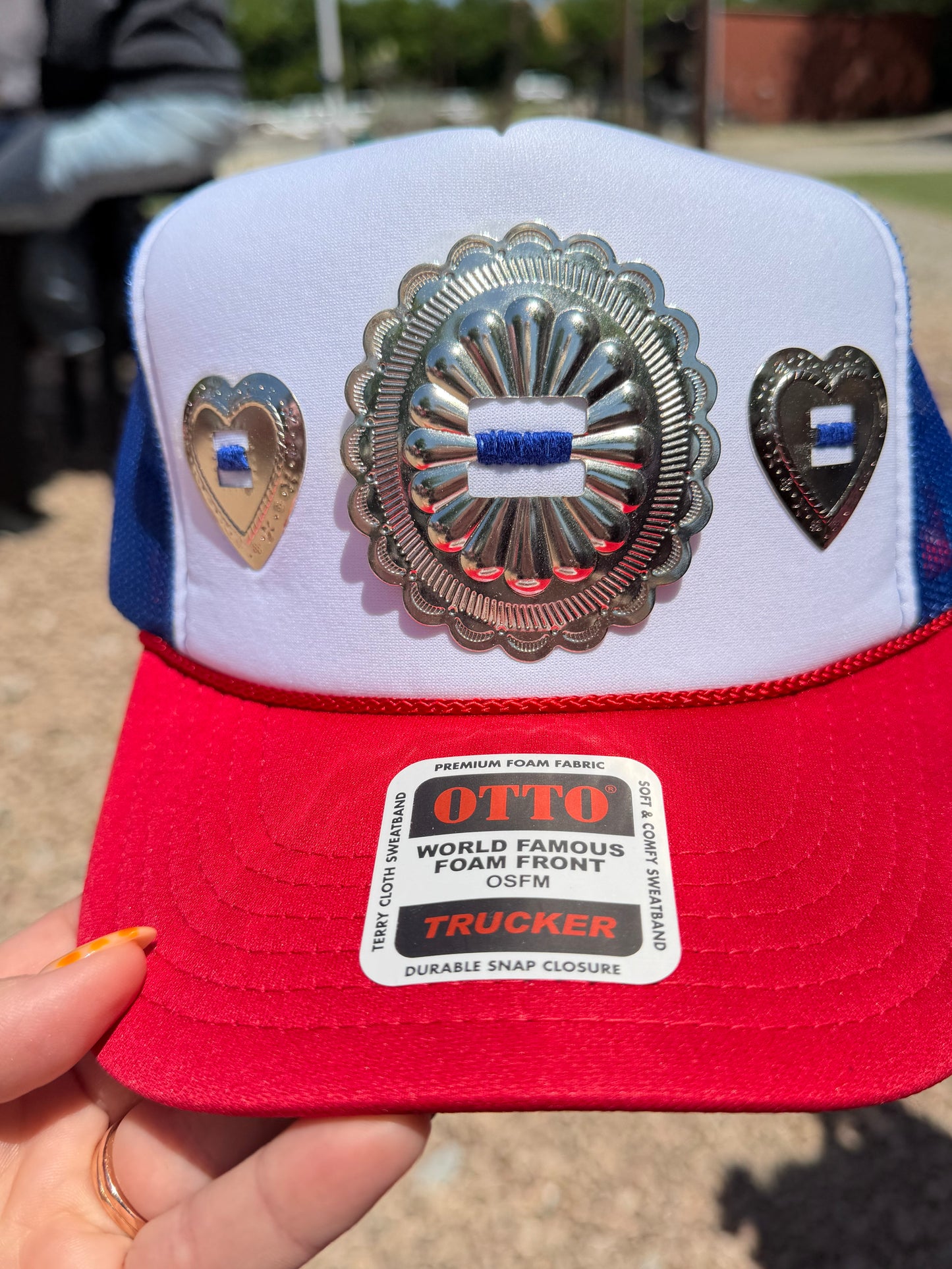 Silver concho with red, white & blue hat