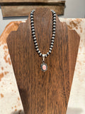Pink conch pendant