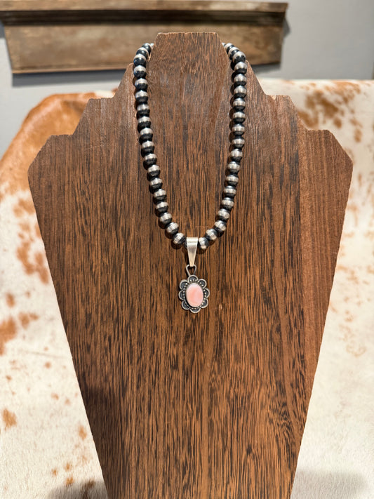 Pink conch pendant