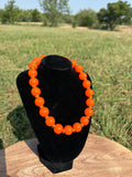 The juicy orange with gold saucers necklace  -16”