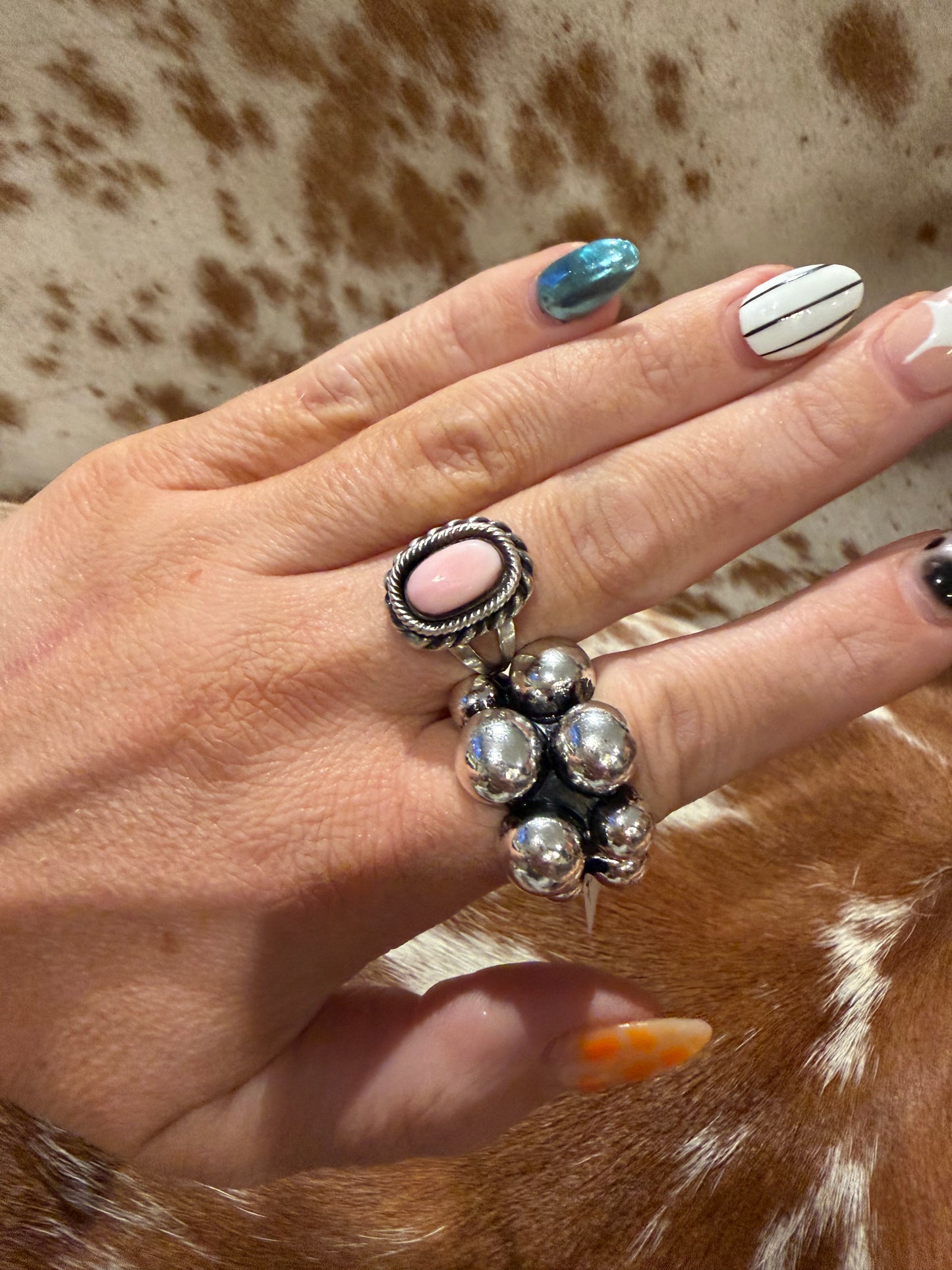 Pink conch ring