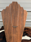 Graduated silver pearl necklace