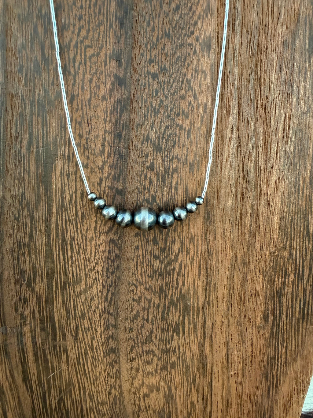 Graduated silver pearl necklace