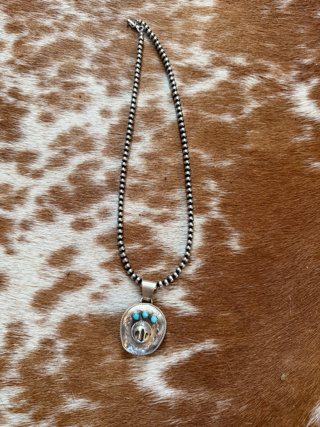 Cowboy and Kingman turquoise pendant