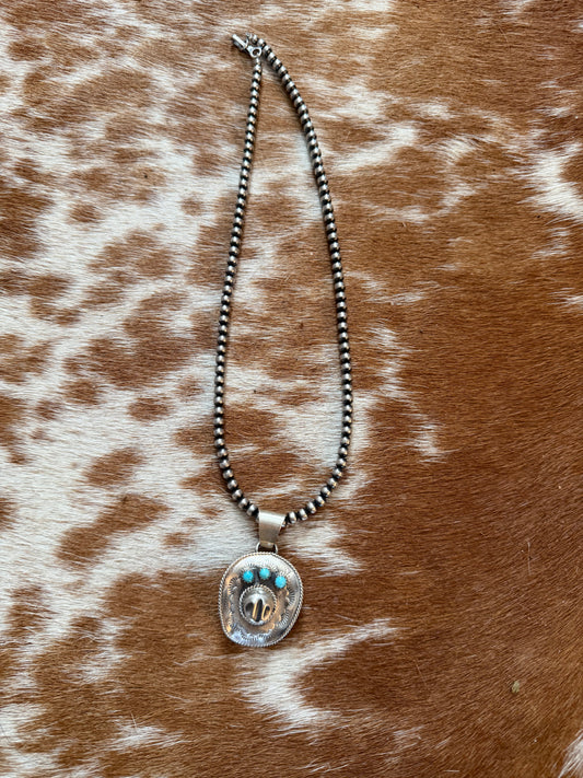 Cowboy and Kingman turquoise pendant